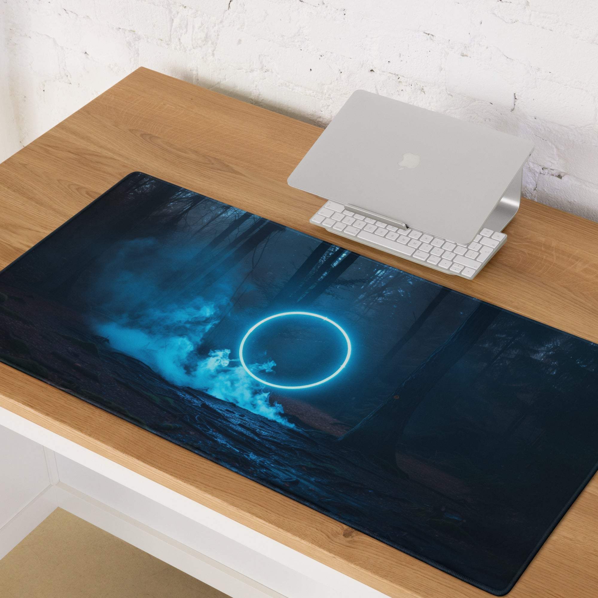Sleek large gaming mouse pad with dark forest neon blue glow and non-slip base