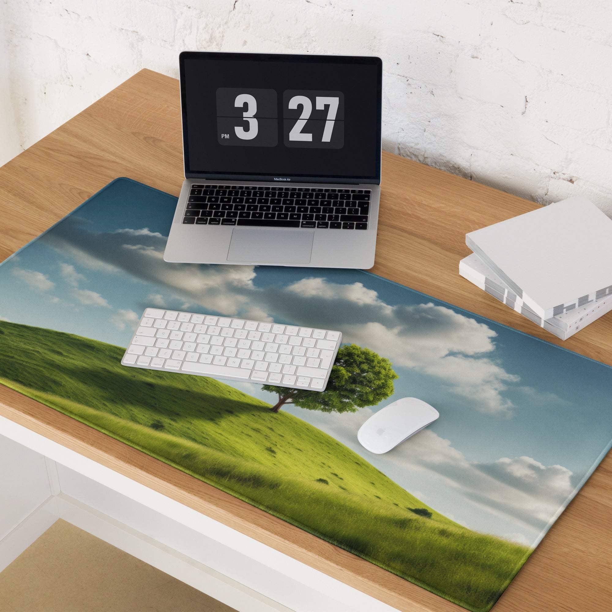 Vibrant green hill with tree under blue cloudy sky on large gaming mouse pad