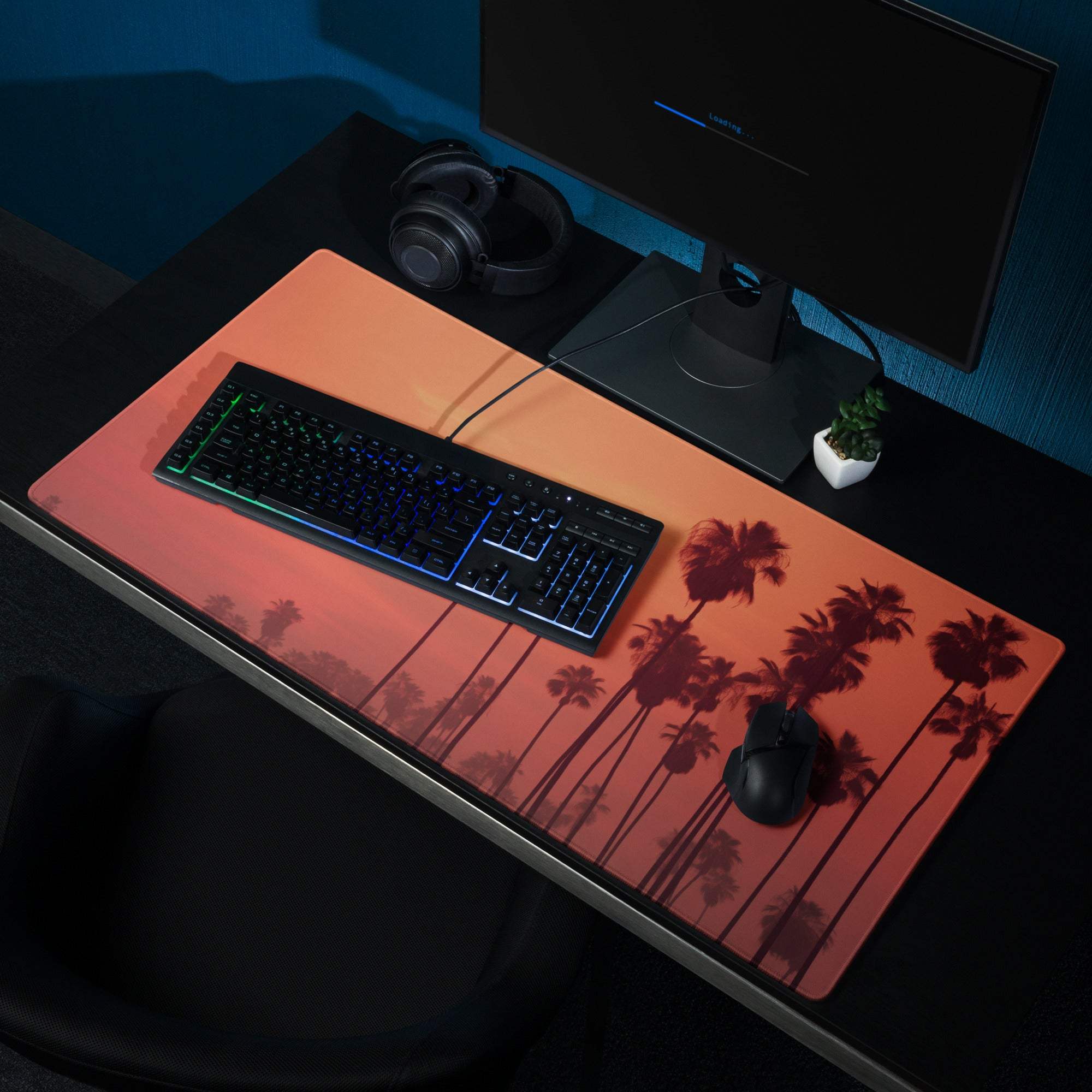 Orange palm tree silhouette on vibrant sunset gaming mousepad