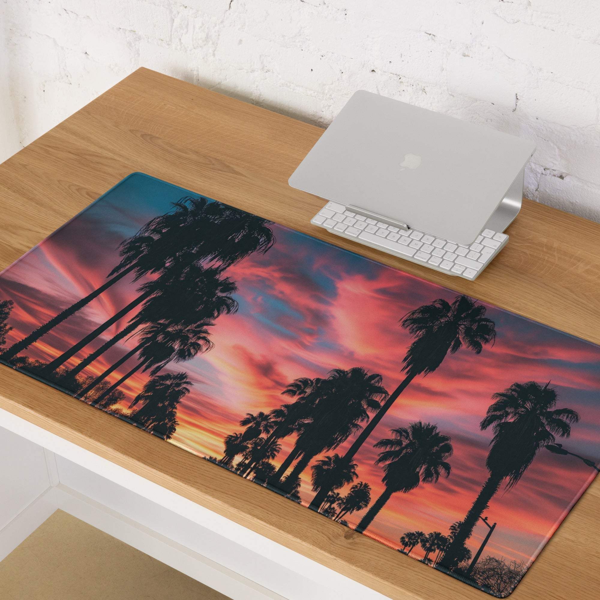 Large palm tree sunset gaming mouse pad with non-slip back and stitched edges