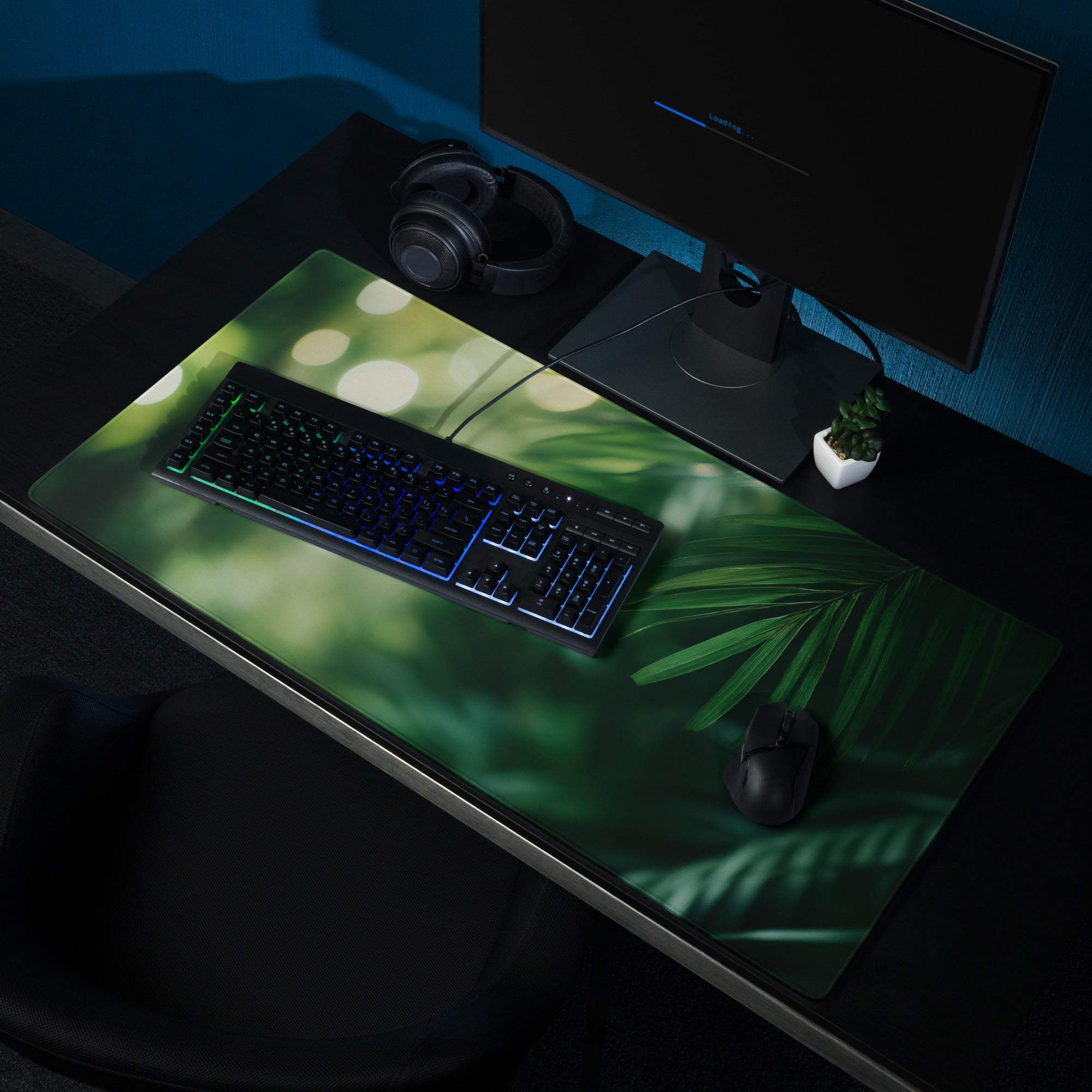 Green tropical leaf gaming mouse pad with glossy finish and stitched edges