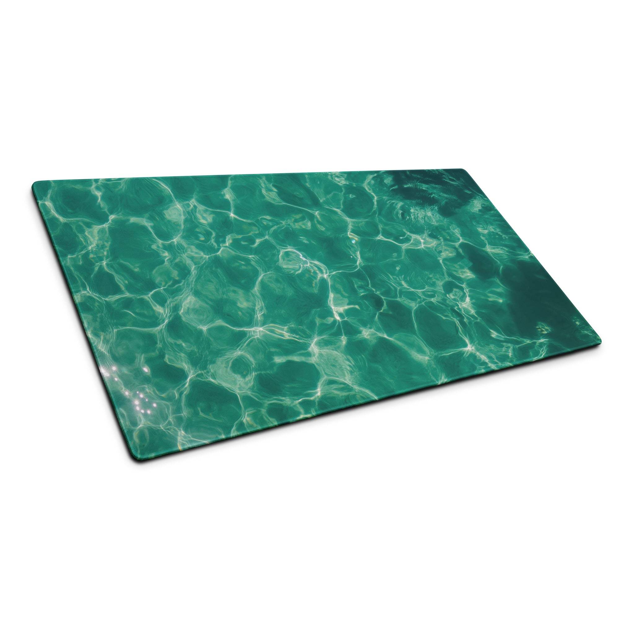 Teal green ocean wave mouse pad with ripple glass cutting board design