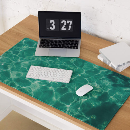 Emerald green ripple desk mat with glossy finish and non-slip base