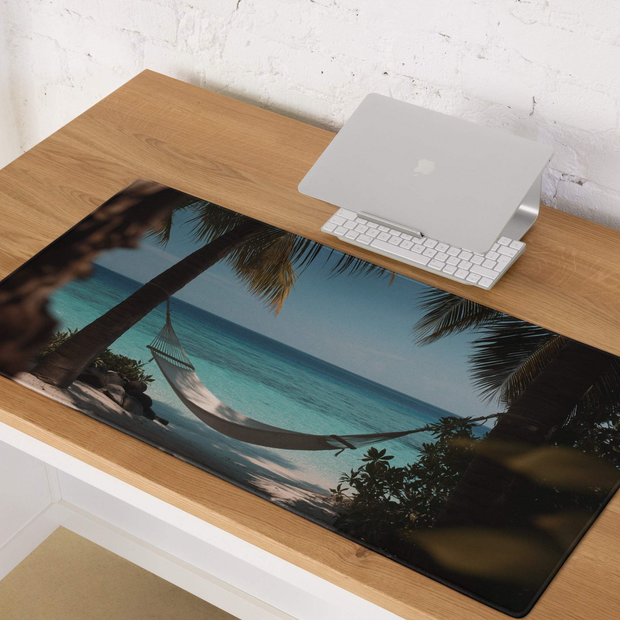 Tropical beach hammock desk mat in beige black with ocean blue non-slip base