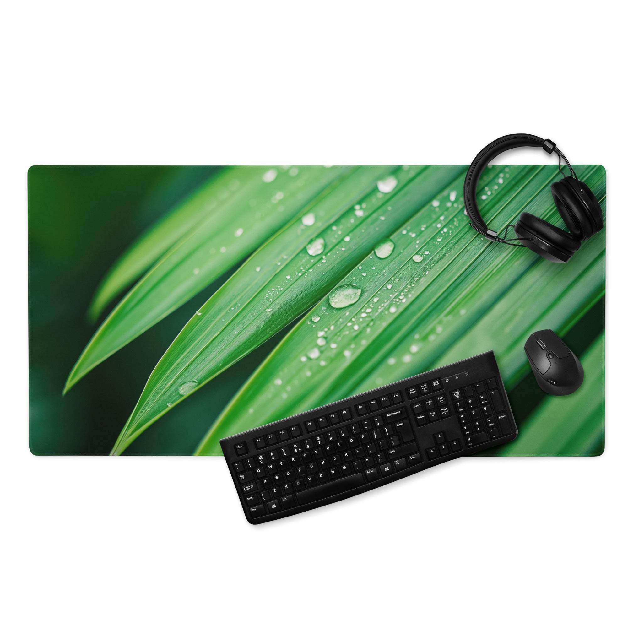 Green leaf-patterned gaming mouse pad with water droplets, non-slip base