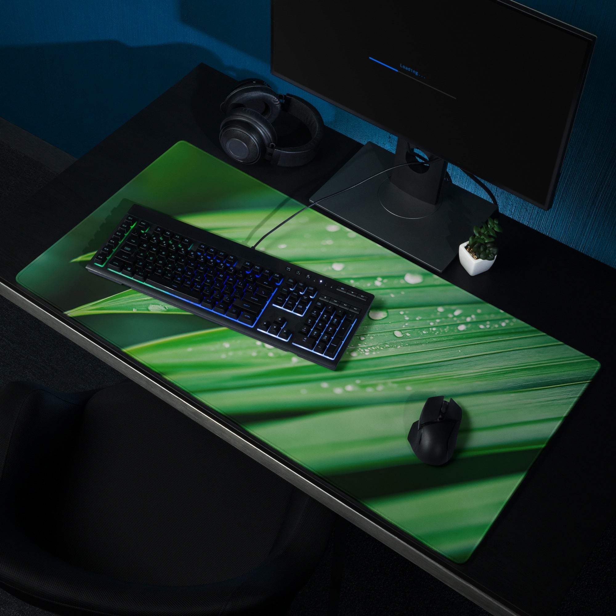 Green leaf-patterned gaming mousepad with water droplets, non-slip base
