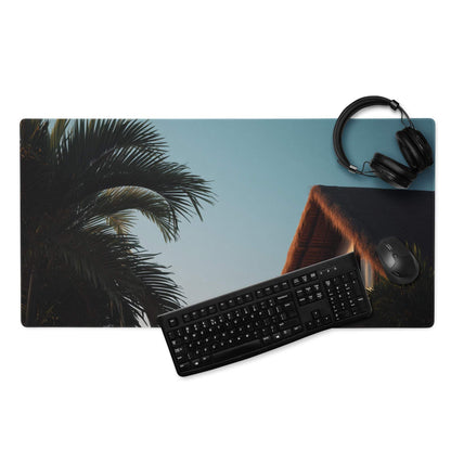Large tropical palm sunset gaming mouse pad with palm fronds, sky and thatched roof