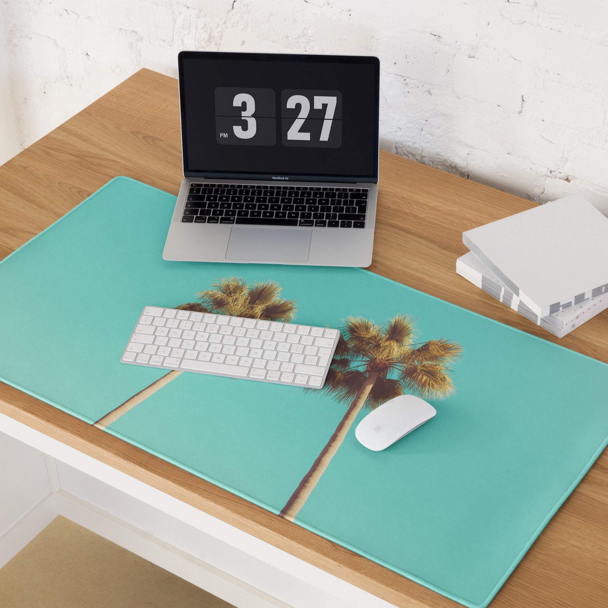 Tropical palm tree design on vibrant teal gaming mouse pad