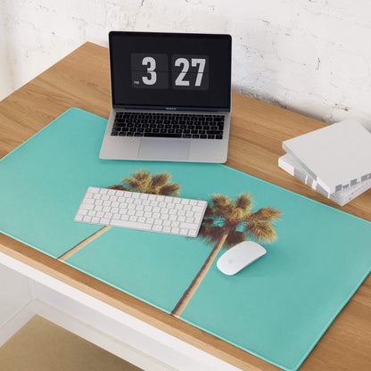 Tropical palm tree design on vibrant teal gaming mouse pad