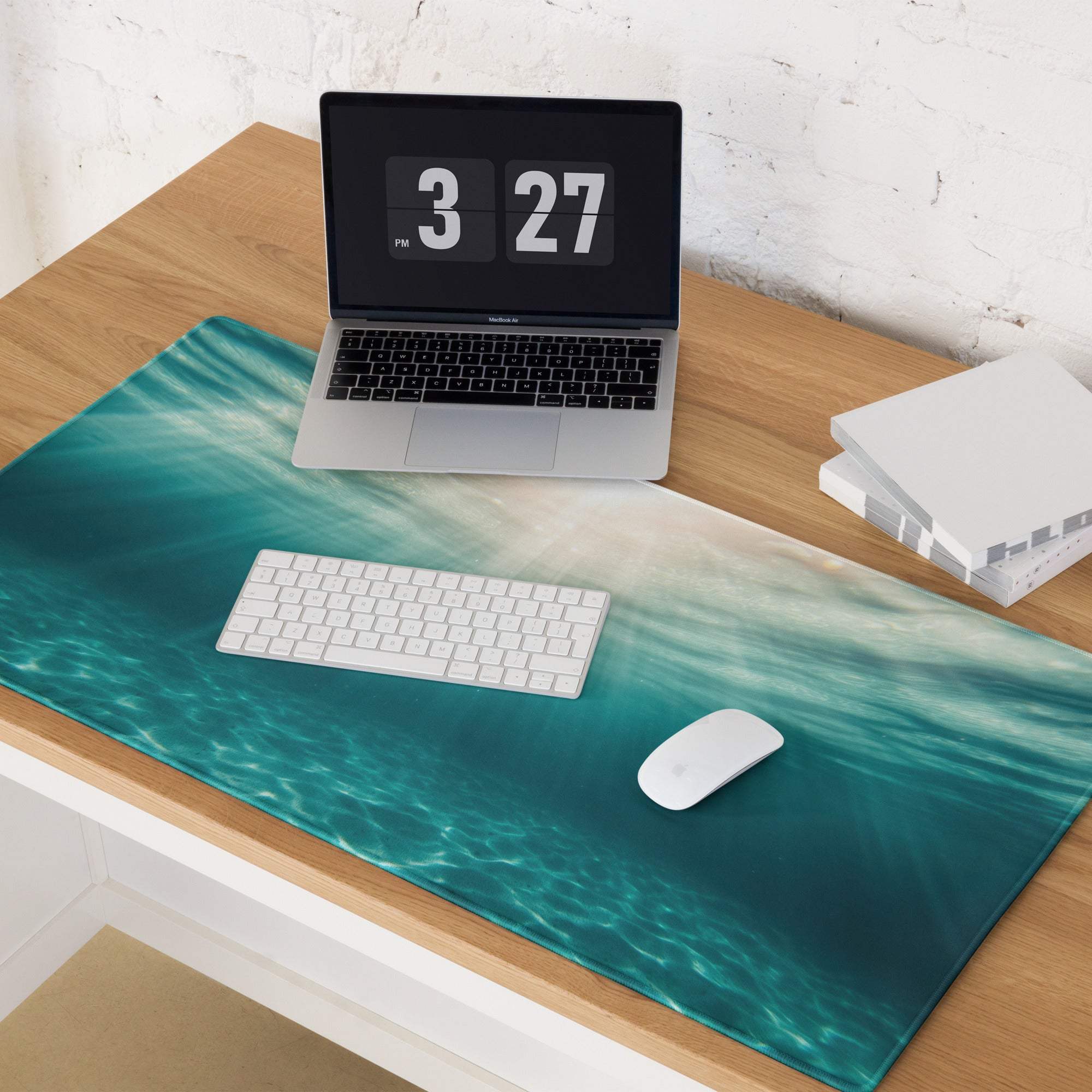 Teal ocean wave desk mat on large non-slip gaming mouse pad