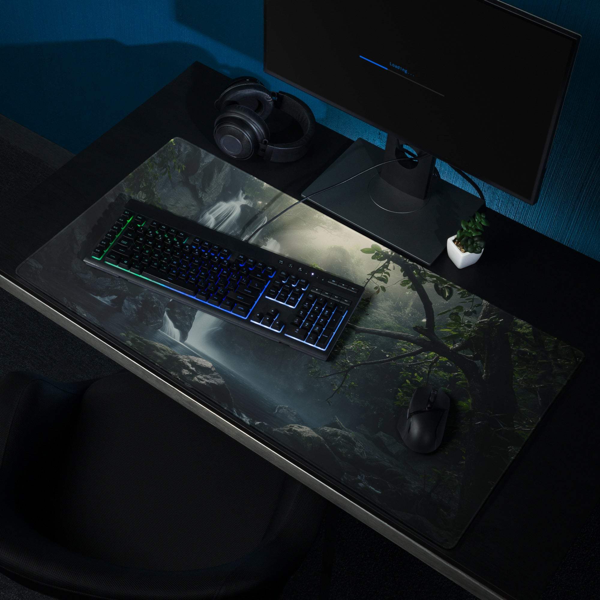 Dark glossy large gaming mouse pad with misty forest waterfall scene