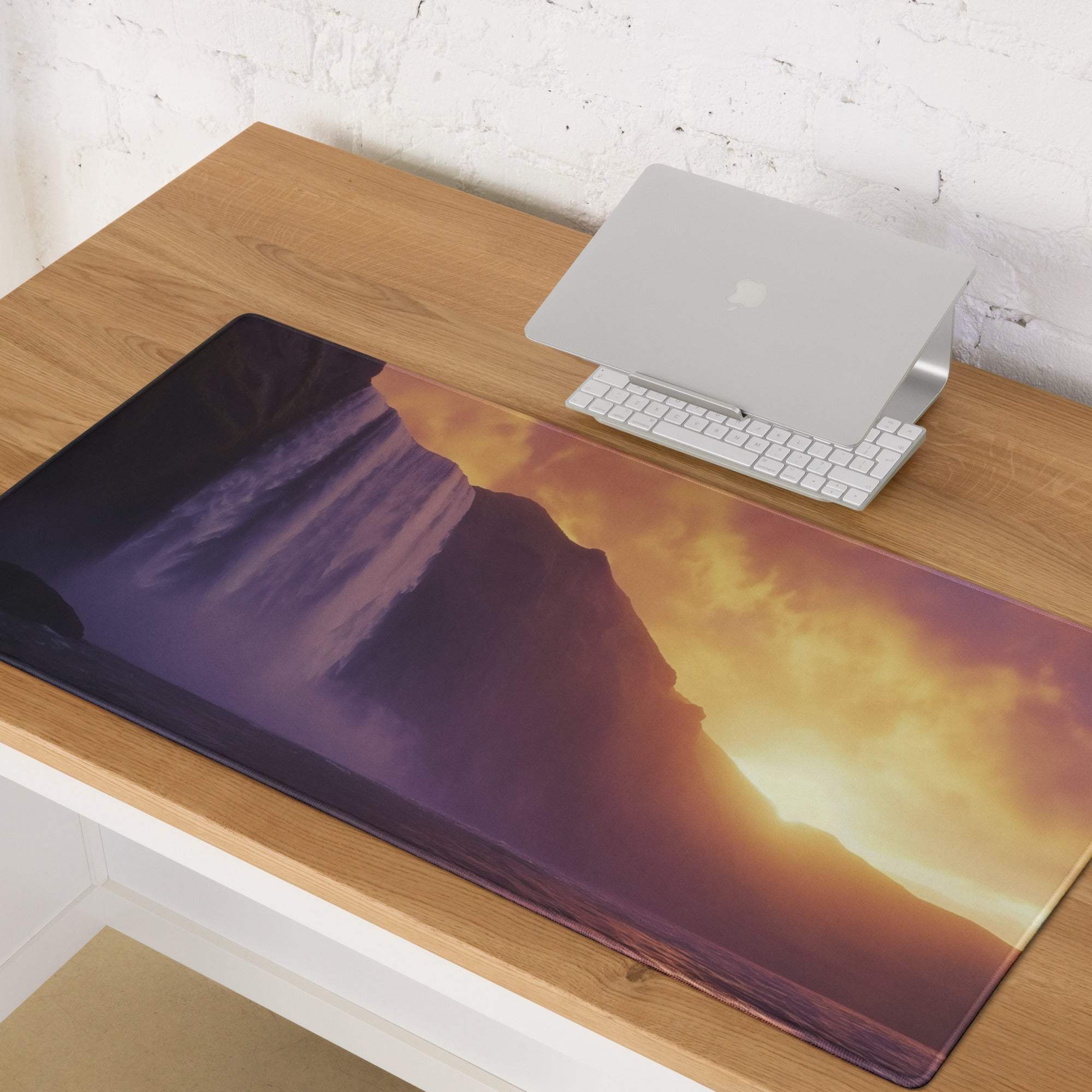 Epic sunset over mountains on large gaming mouse pad with non-slip backing