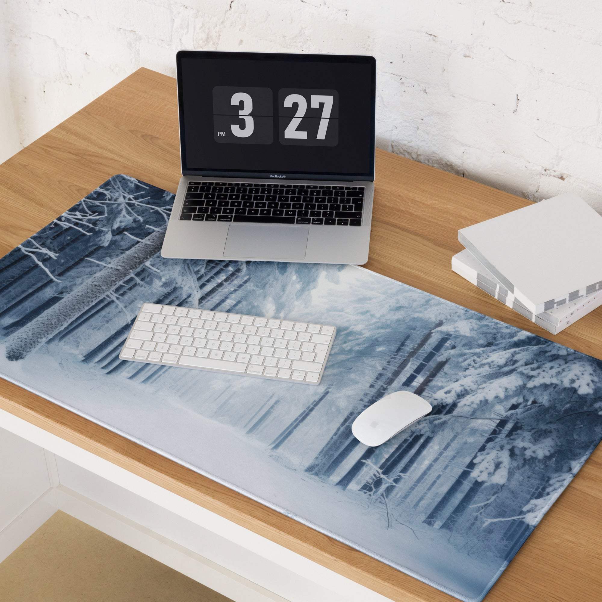 Blue and white winter forest gaming mousepad with frosty snowy landscape