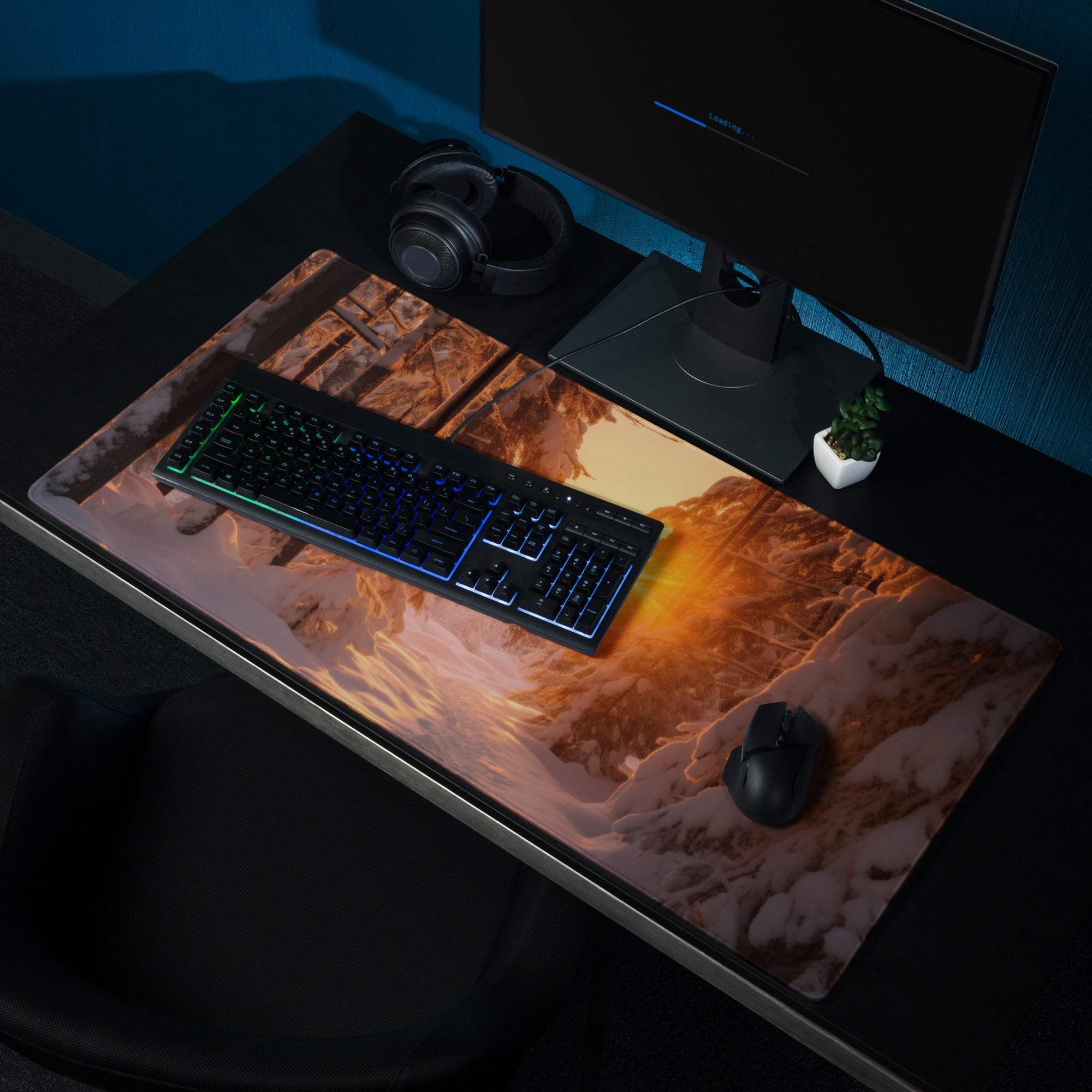 Vivid snowy mountain sunrise gaming mousepad with warm orange glow