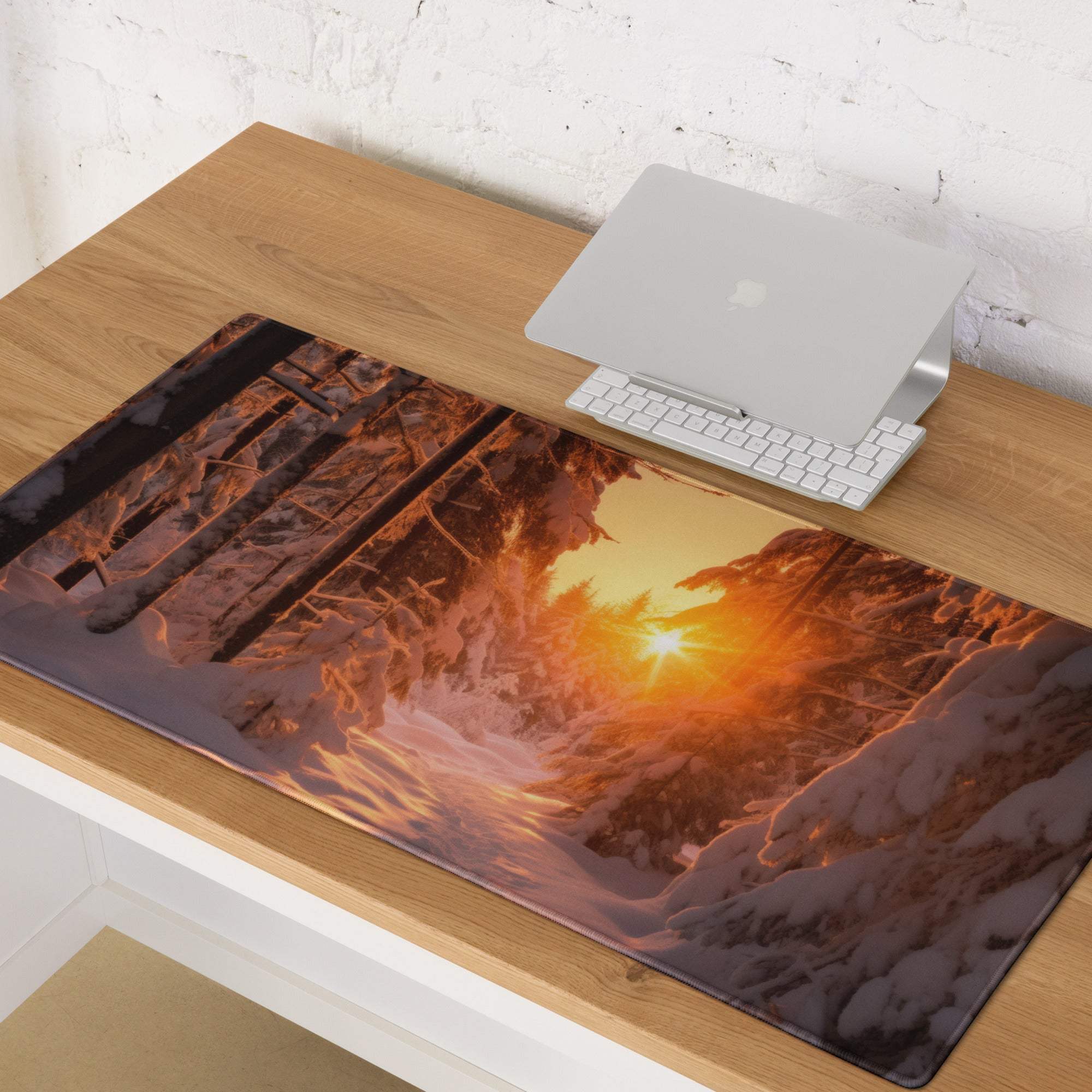 Vivid snowy forest sunrise gaming mouse pad with orange glow