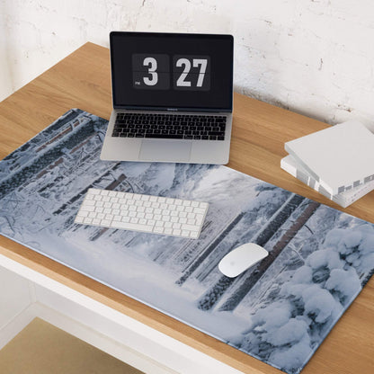 Winter forest gaming mouse pad with frosty snow tree design