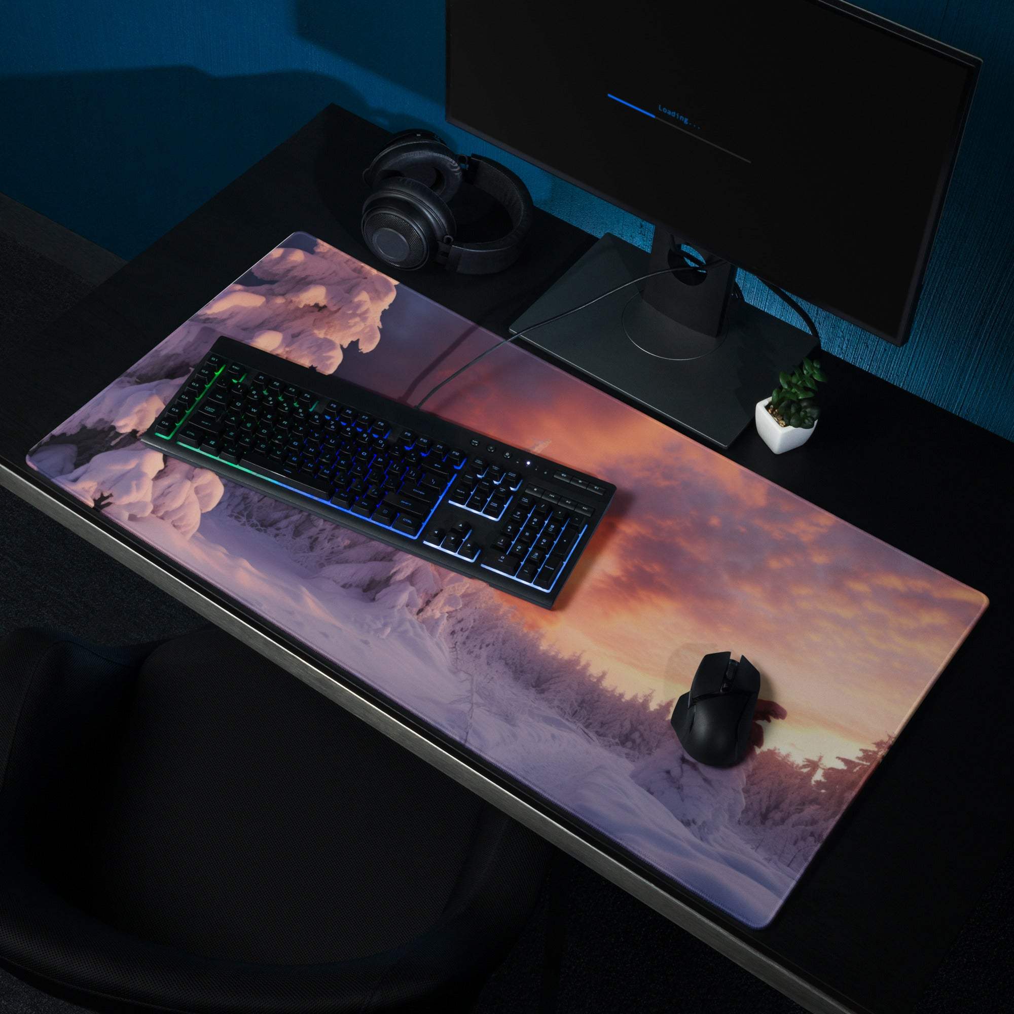 Epic snowy forest landscape at sunset with warm purple orange sky gaming mouse pad