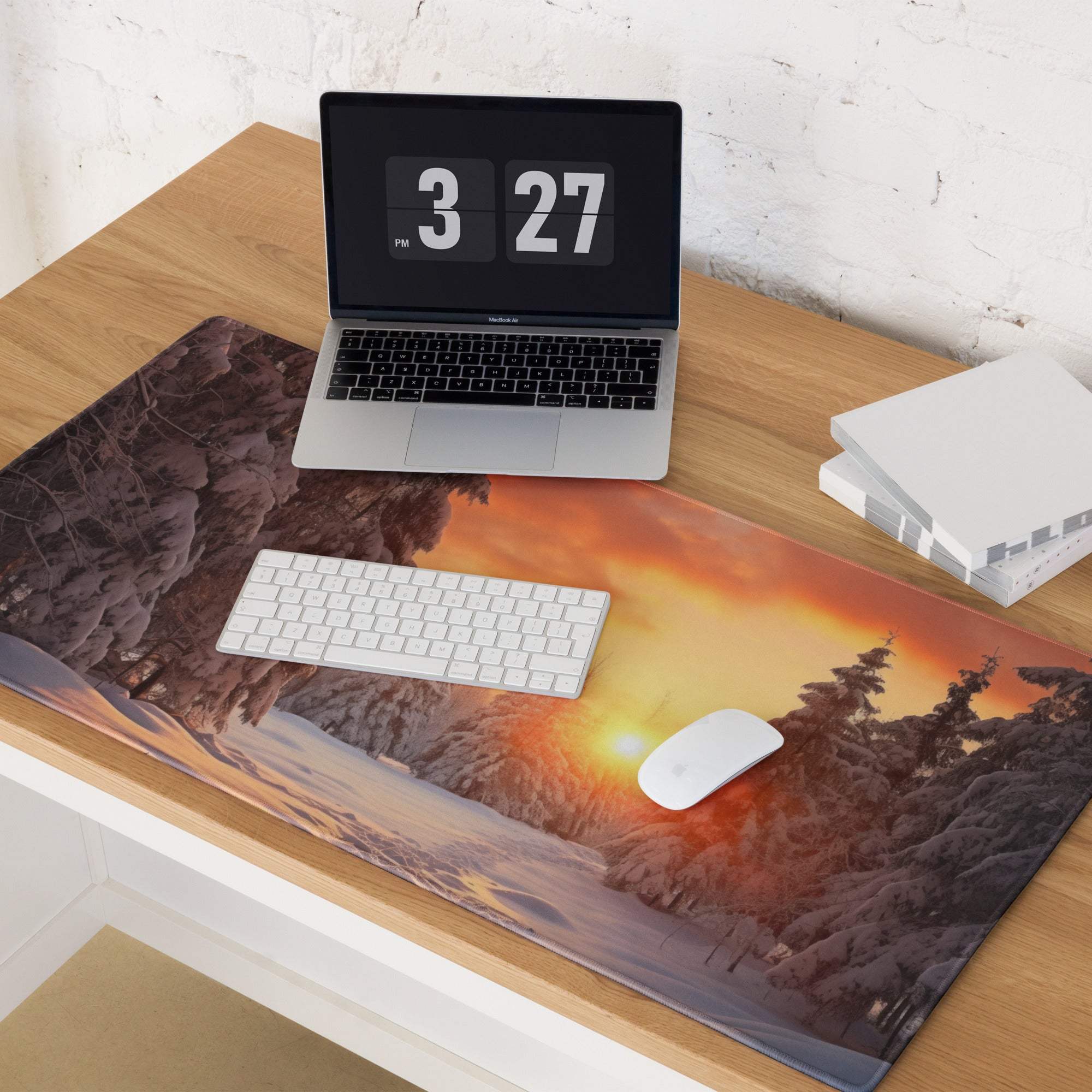 Serene Winter Forest Sunset gaming mouse pad with warm orange glow