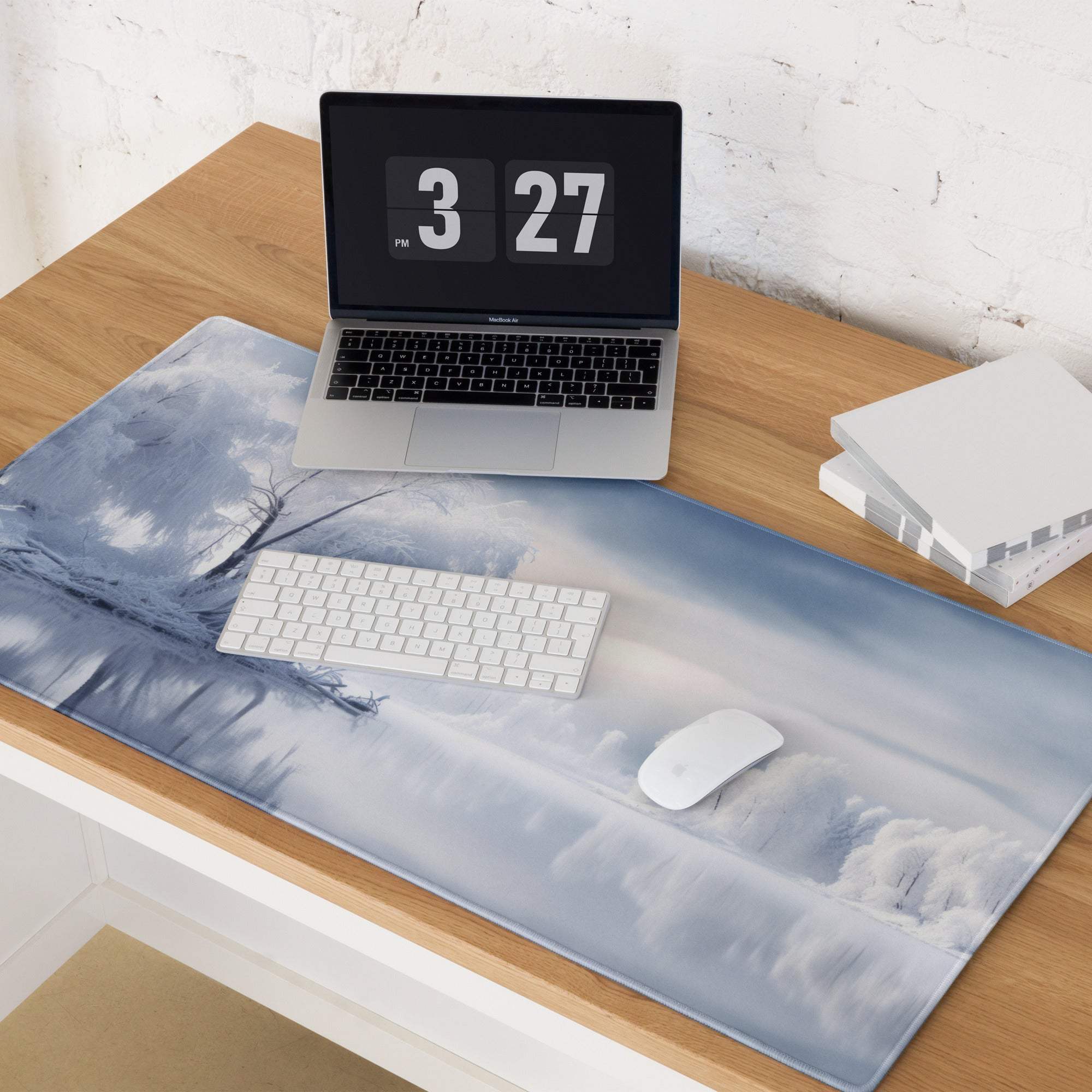 Blue and white winter landscape mousepad with frosty tree silhouettes