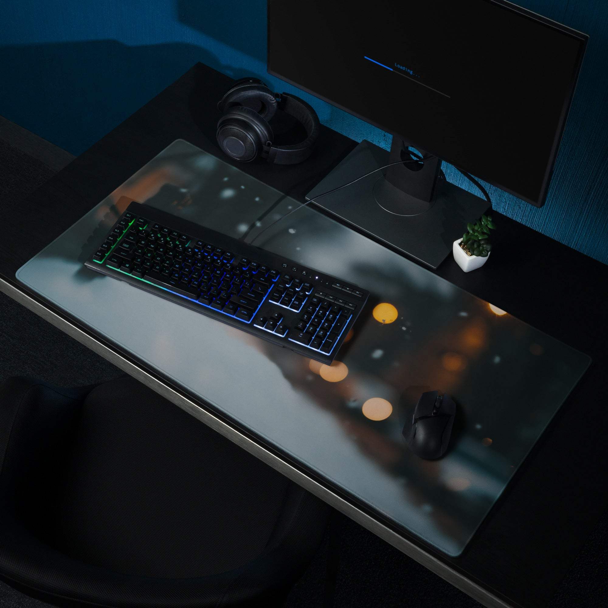 Moody Midnight Blue gaming mouse pad with illuminated cityscape, bokeh lights, snowfall