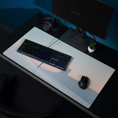 Sleek large pastel winter landscape gaming mouse pad with gray-to-peach gradient, non-slip base, stitched edges