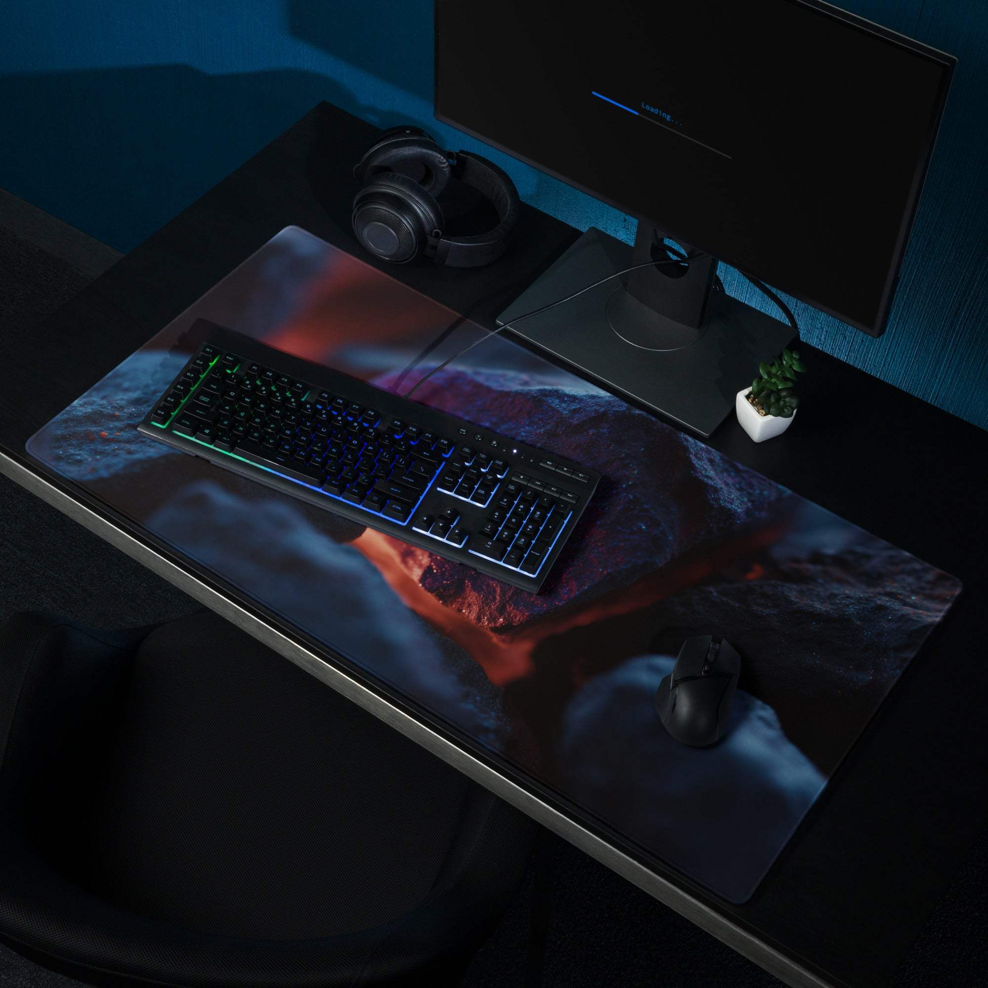 Dark blue neon glow gaming mouse pad with volcanic lava landscape
