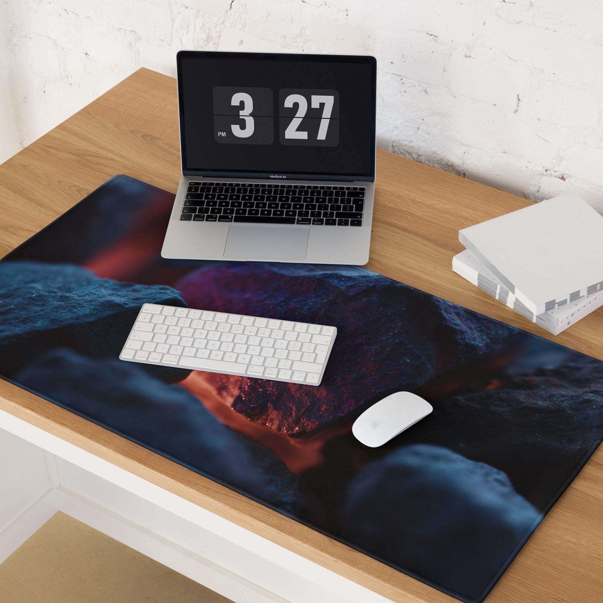 Dark blue neon glow gaming mouse pad with volcanic rock design