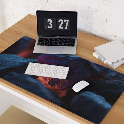 Dark blue neon glow gaming mouse pad with volcanic rock design