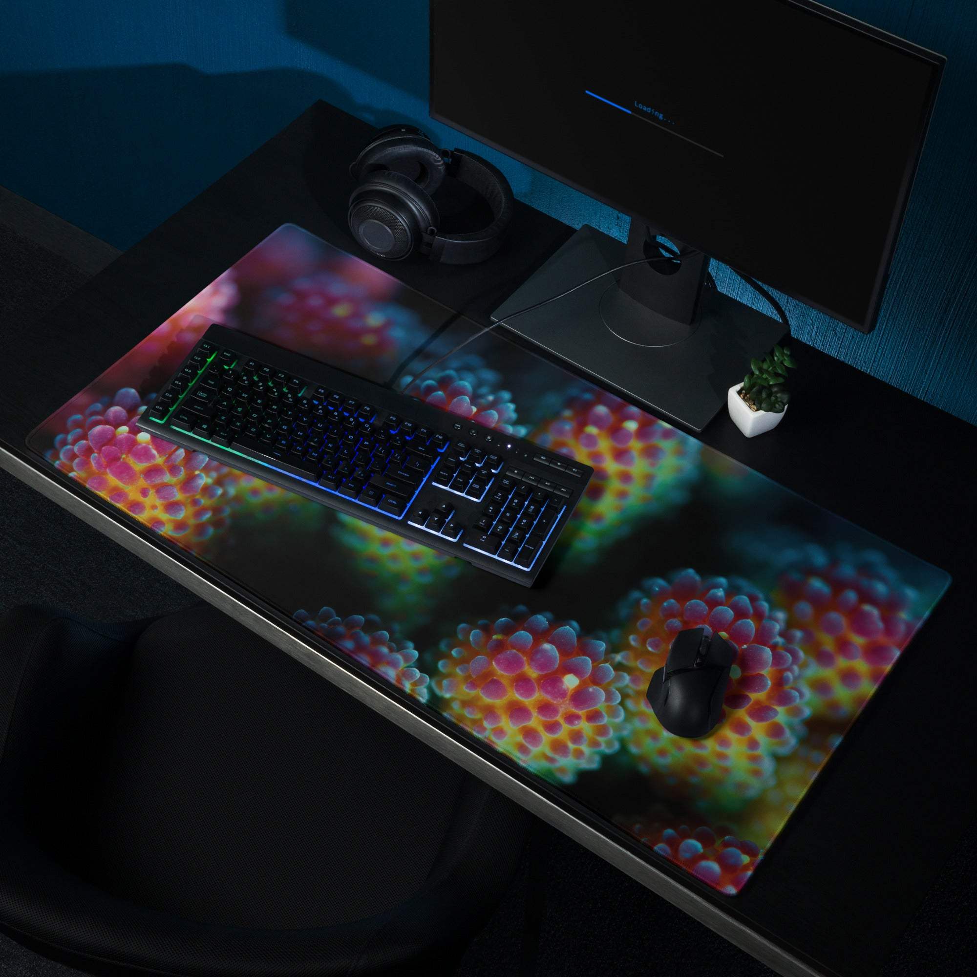Vibrant coral reef gaming mouse pad with glowing molecular design, non-slip base, stitching