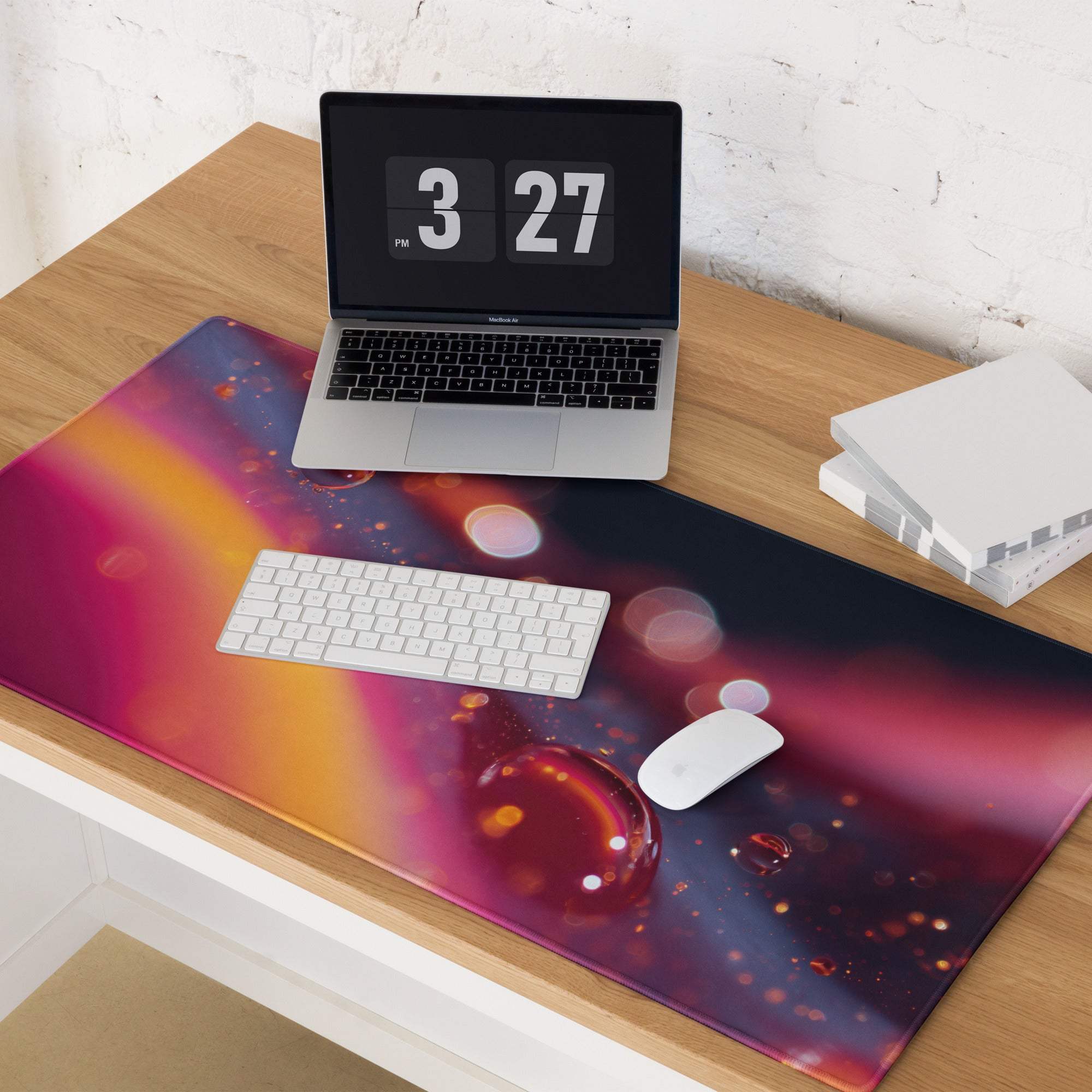 Vivid neon gradient gaming mouse pad with cosmic magenta orange purple swirls and glowing orbs