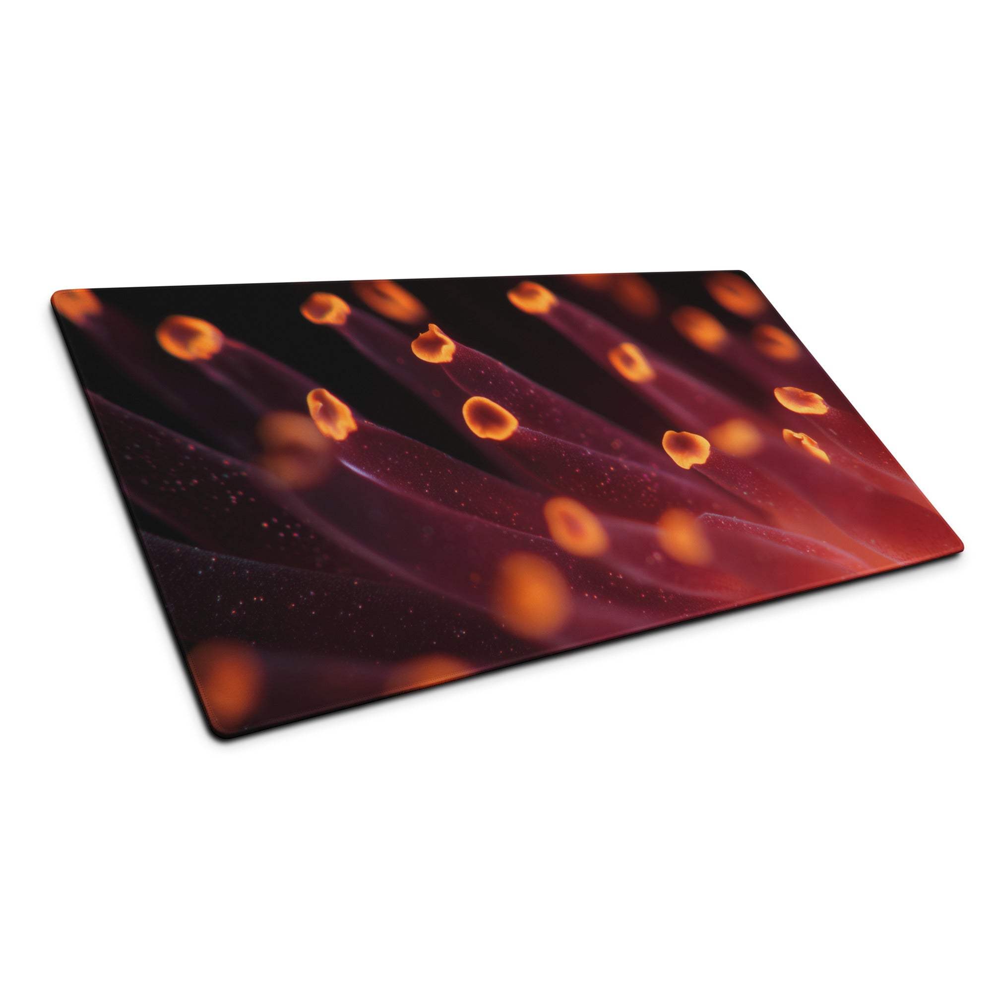 Premium large gaming mouse pad with orange glow patterns on red black background