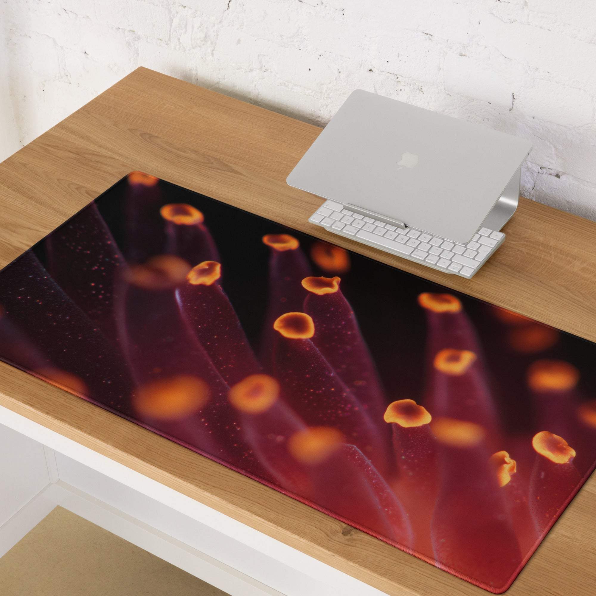 Premium large gaming mousepad with vivid red orange coral glow design