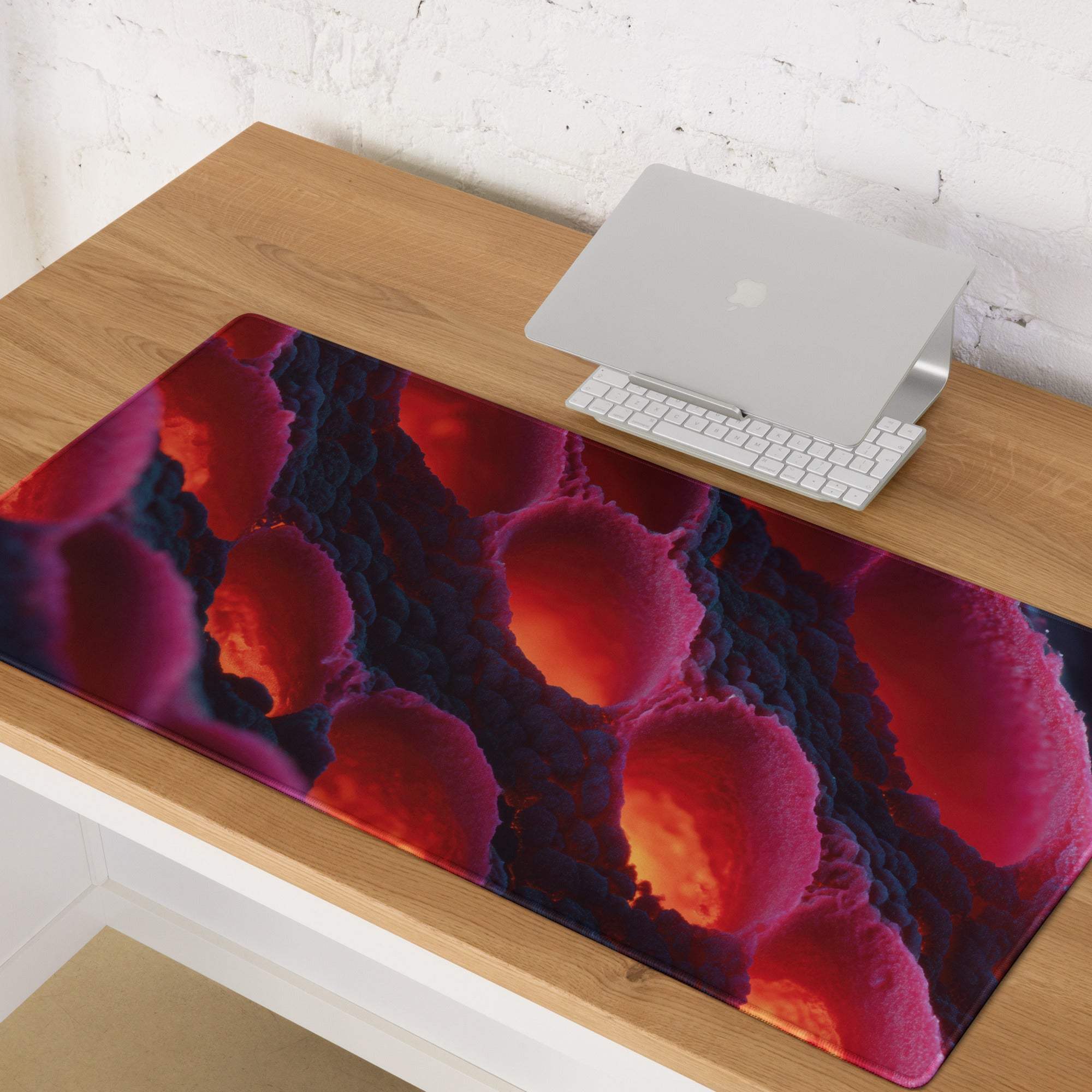 Large non-slip gaming mousepad in vibrant lava red and purple swirling hues