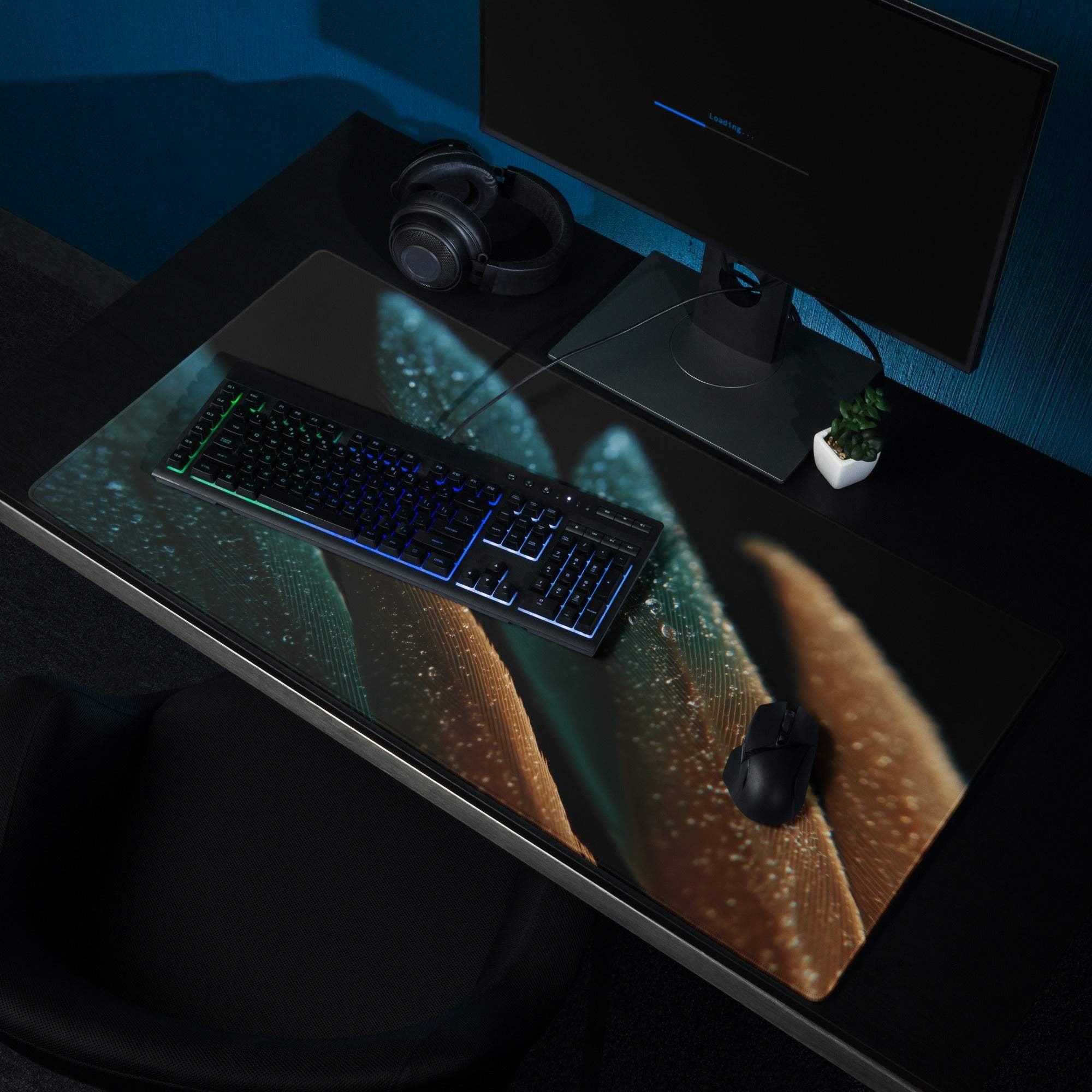 Modern teal and amber feather gaming mouse pad with non-slip base