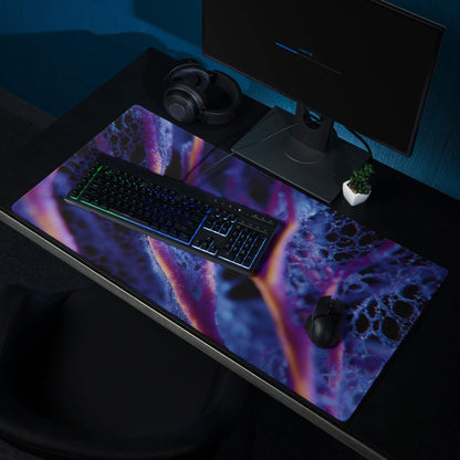 Vibrant cosmic nebula gaming mousepad in purple blue orange neon patterns