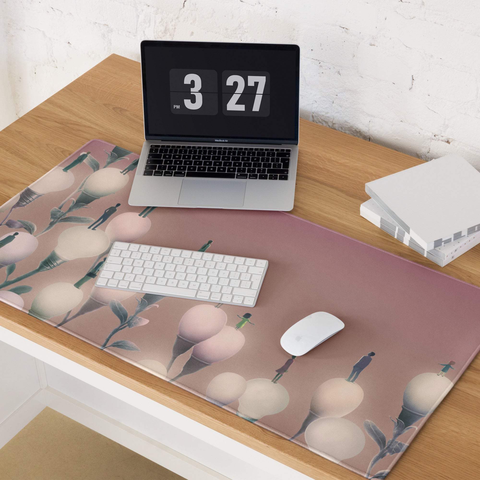 A soft pink rectangular mousepad with blush gradient featuring white calla lilies green stems and tiny silhouetted figures