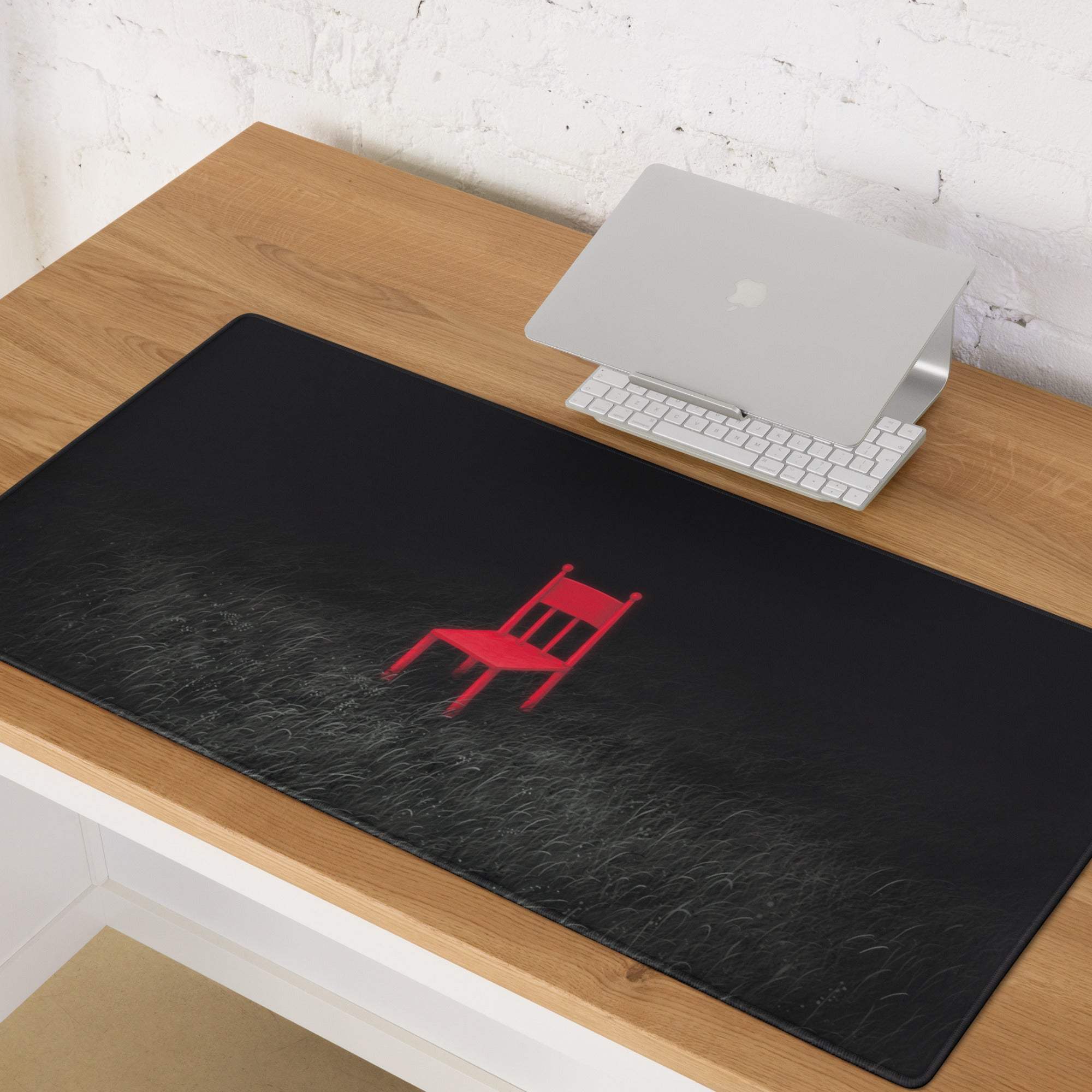 Black textured mousepad featuring a bold red chair silhouette for gaming desk sleek modern decor