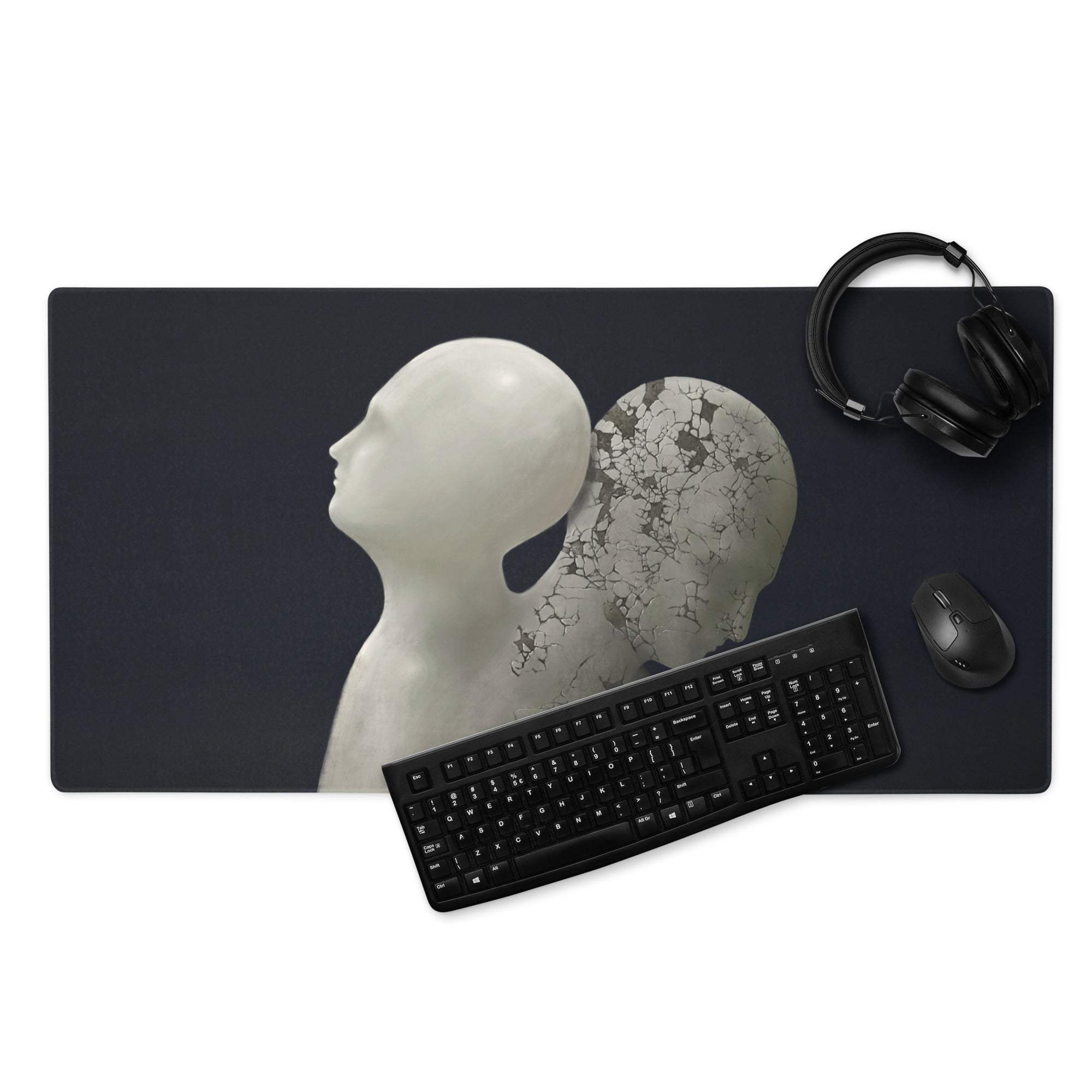 Black rectangular mousepad with surreal cracked marble sculpture artwork in white and gray for modern gaming desk decor
