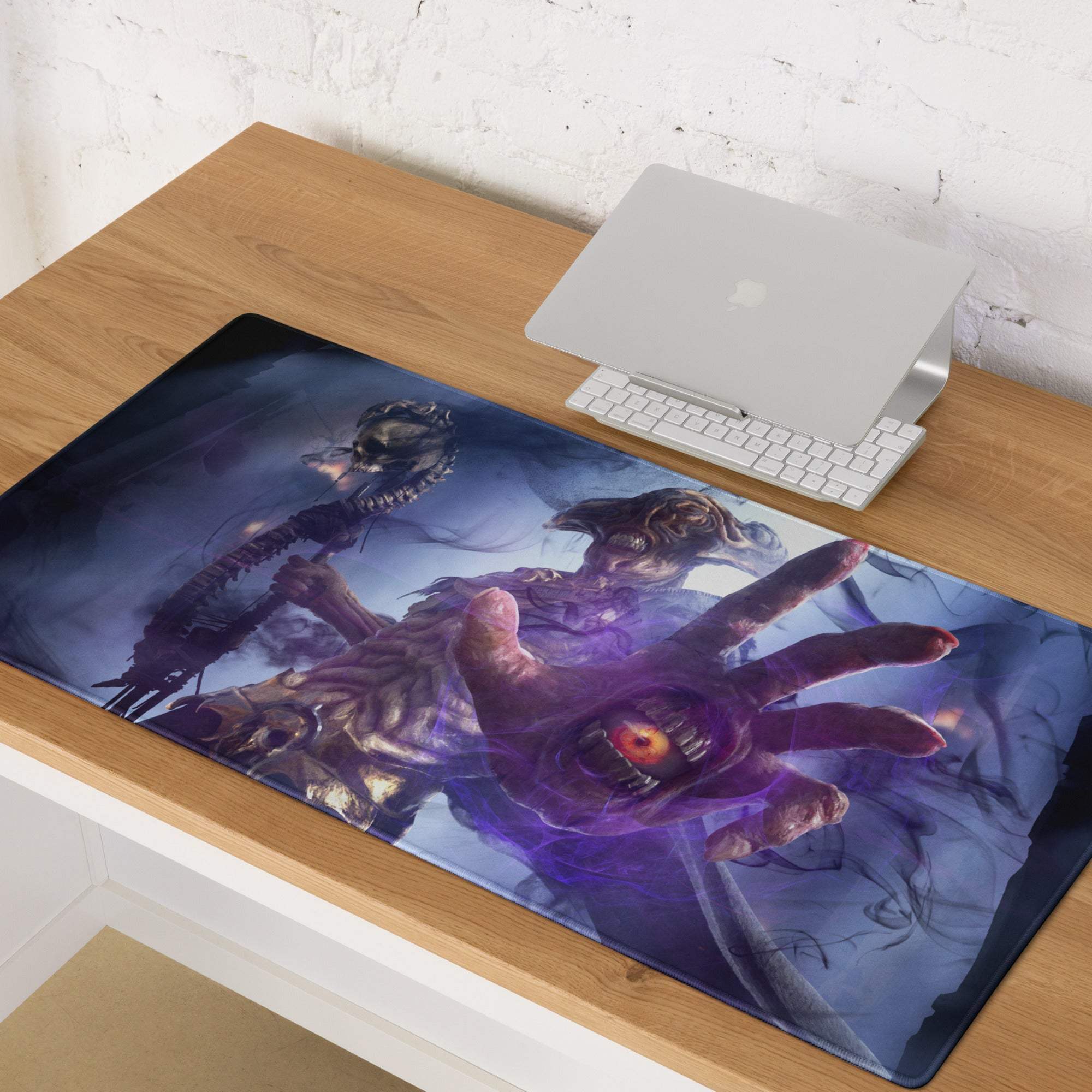 Epic creature art mouse pad featuring dark blue and purple tones with grotesque skeletal hands and glowing orange eyes