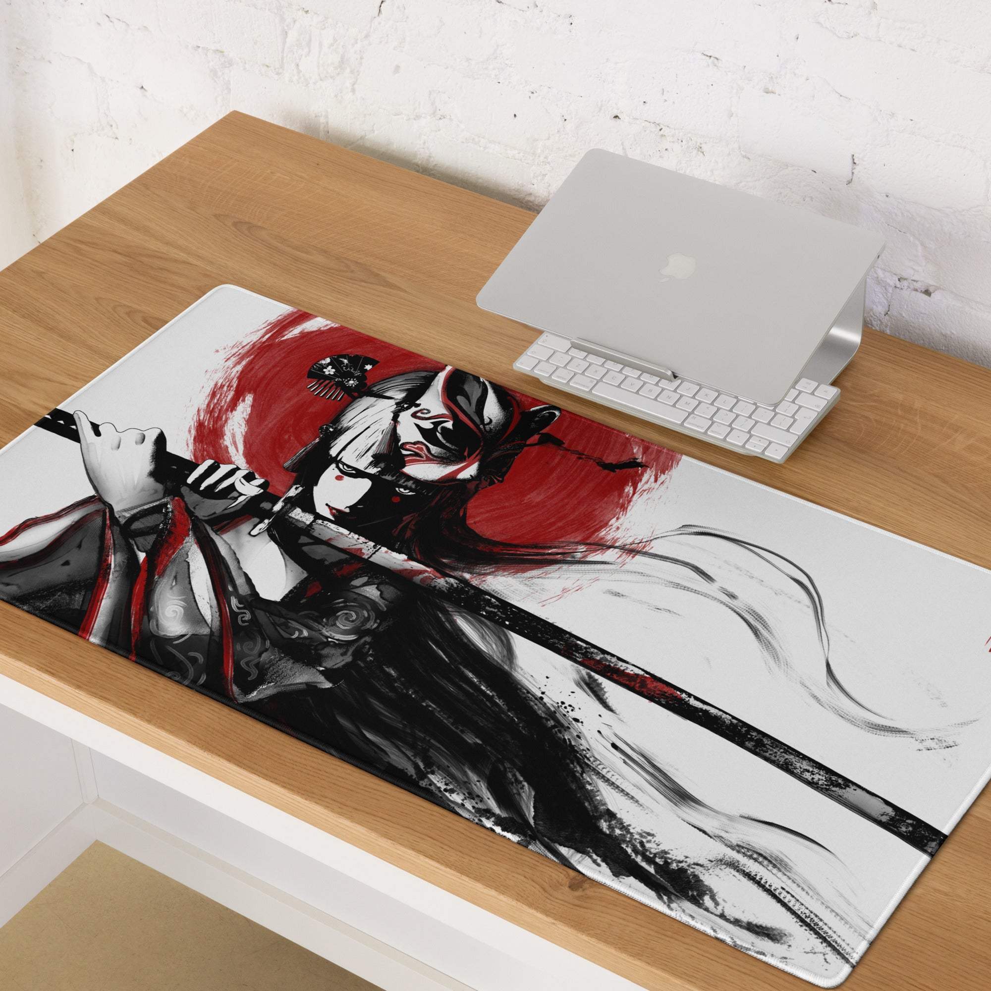 A sleek rectangular gaming mousepad with a black and white samurai illustration and red accents on a bold red background