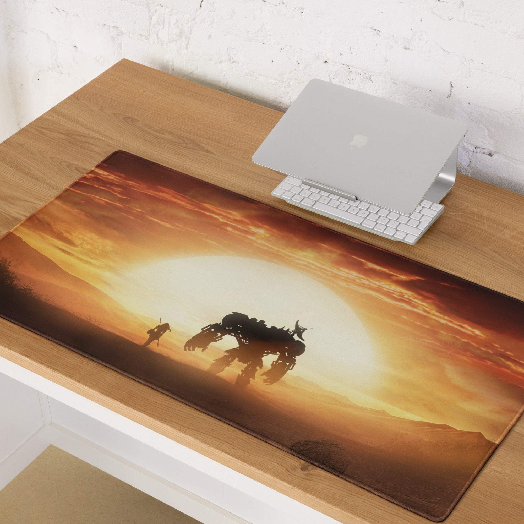 Glossy rectangular gaming mousepad with a dramatic desert sunset featuring silhouettes and a large mecha design