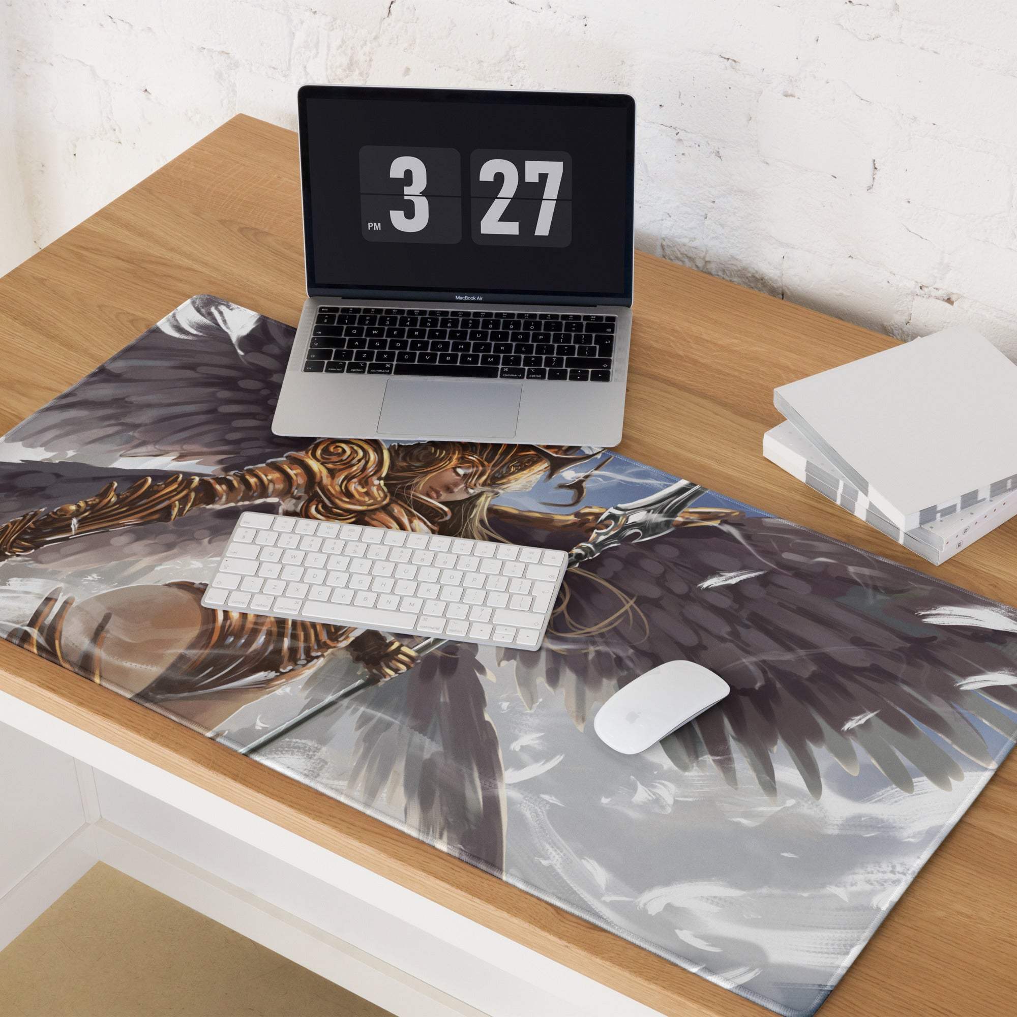 A large rectangular gaming mousepad with a bronze winged warrior in gray and gold for epic fantasy desk decor