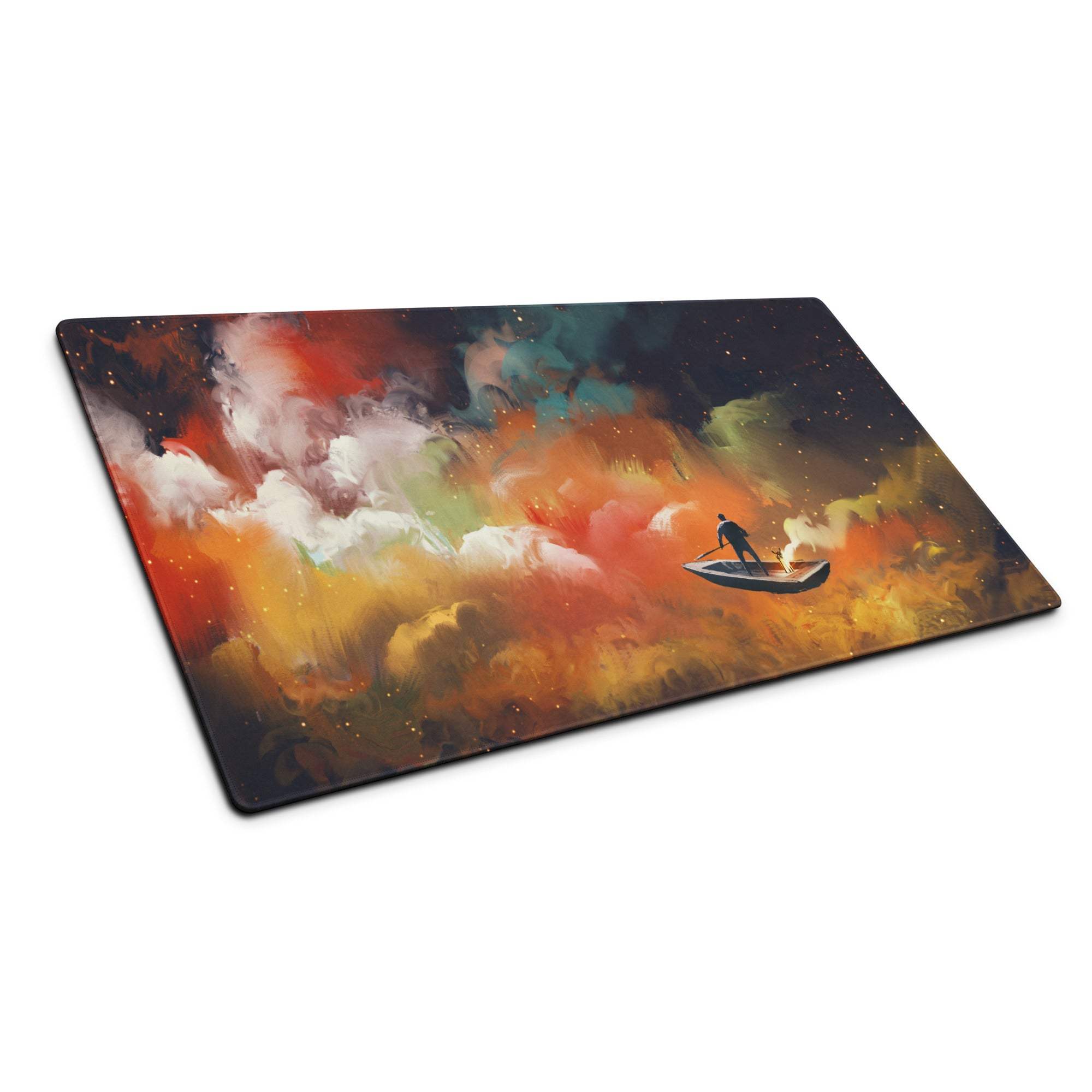 Rectangular celestial ocean canvas desk pad with vibrant cosmic scene in reds orange and purple featuring boat and nebula