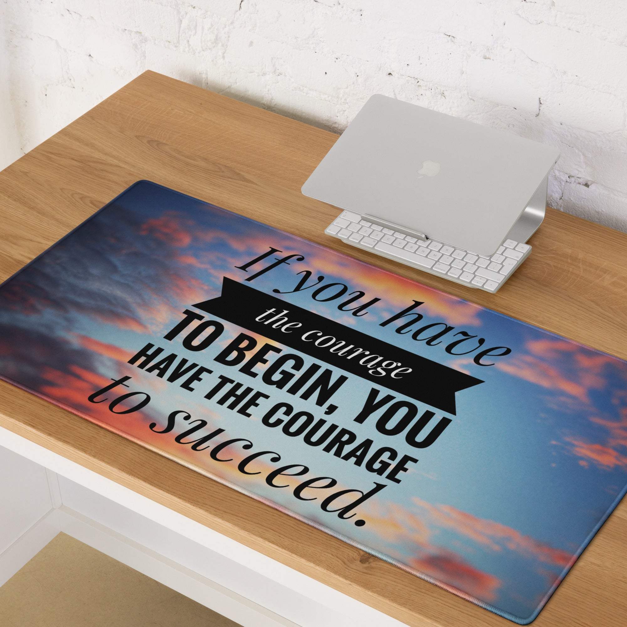 Sunset motivational mouse pad in blue and orange with black text courage quote for office and desk decor
