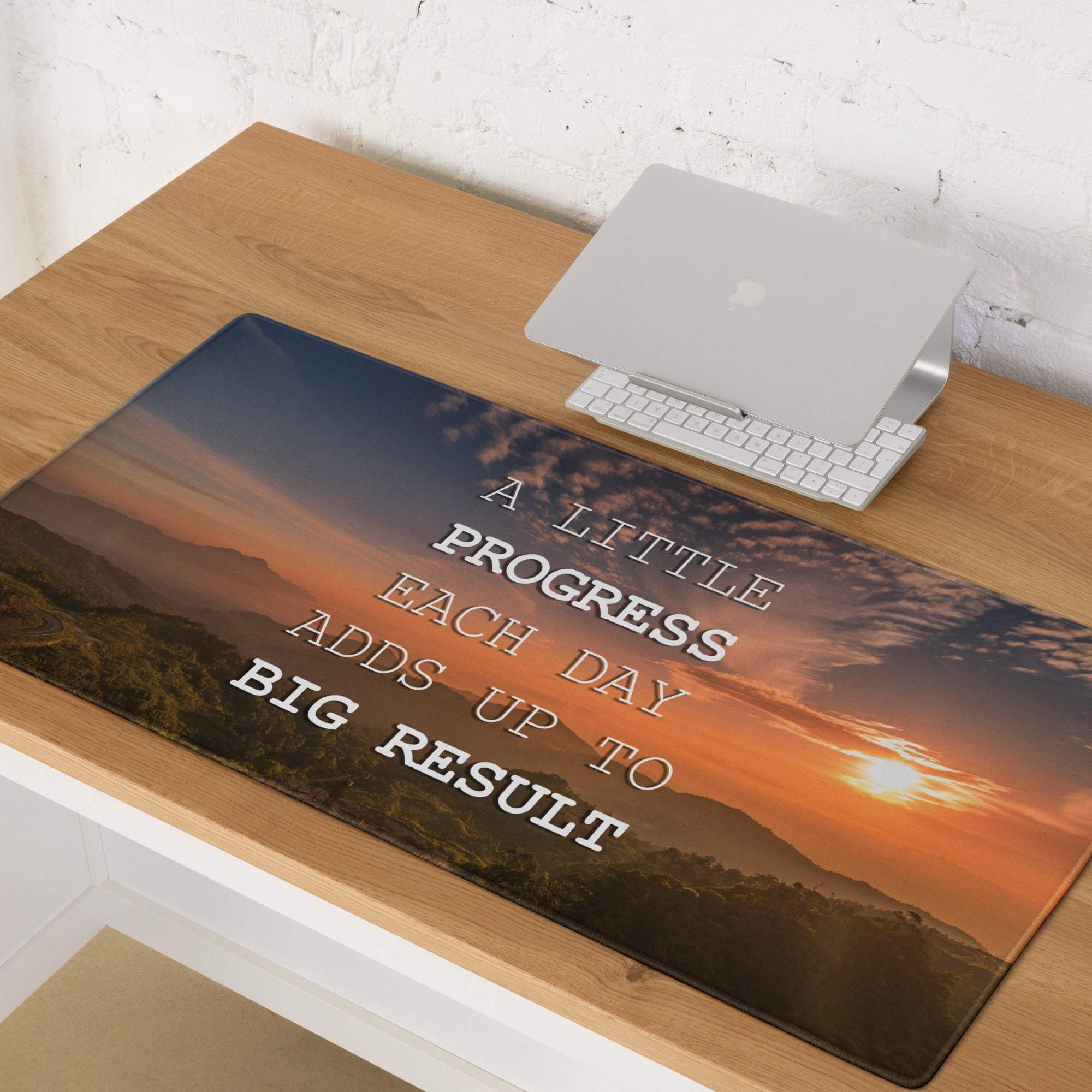 Sunset mountain motivational mouse pad with glossy finish featuring orange navy sunset landscape and white motivational quote