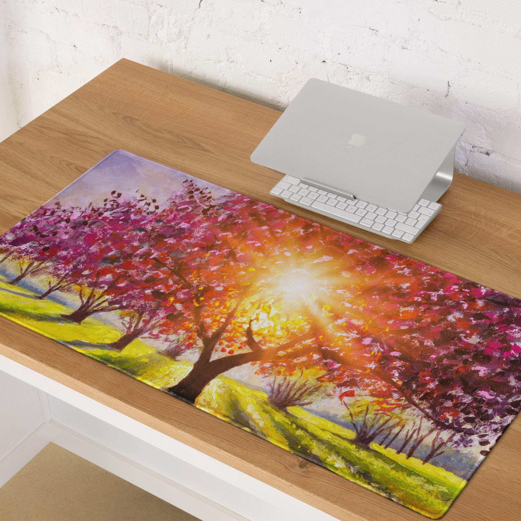 Vibrant autumn-themed cherry blossom pink purple gold rectangular mousepad with painted trees and golden sunburst over hills