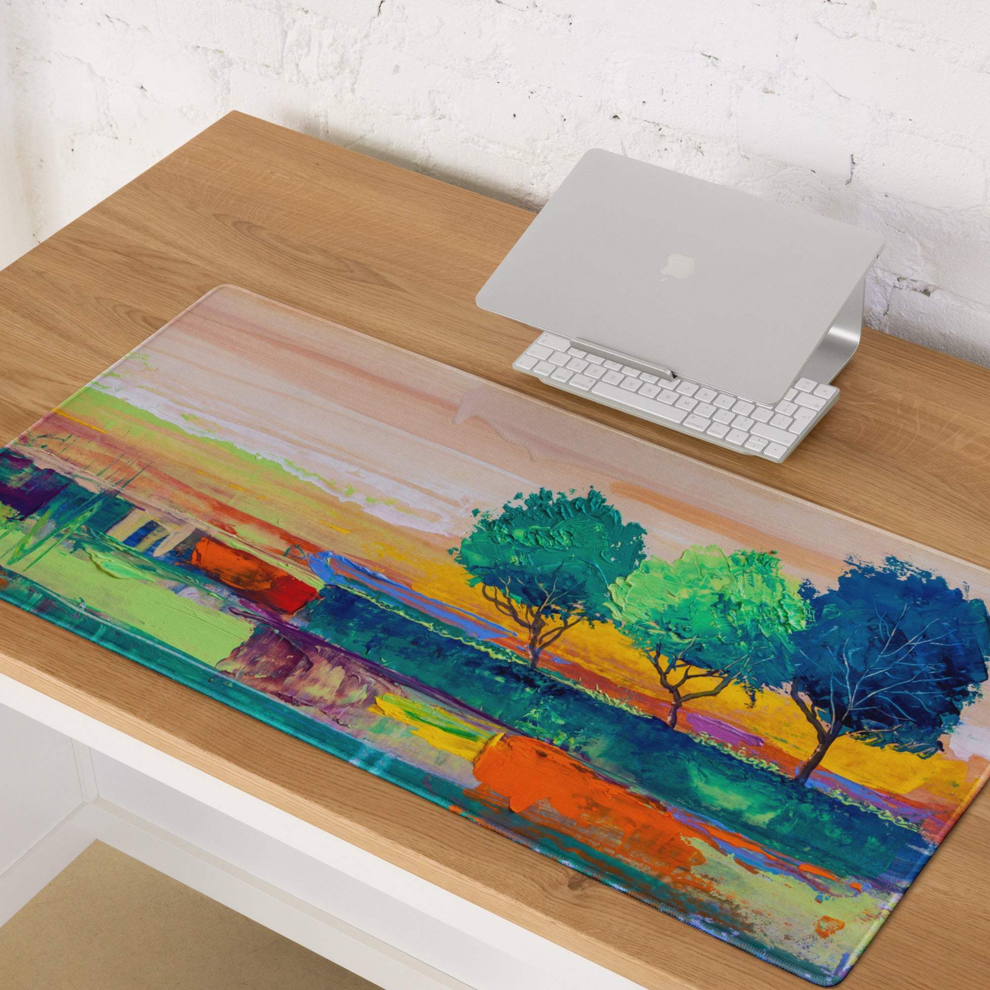 Vivid landscape abstract mouse pad featuring a transparent acrylic surface with multicolor trees and warm background tones