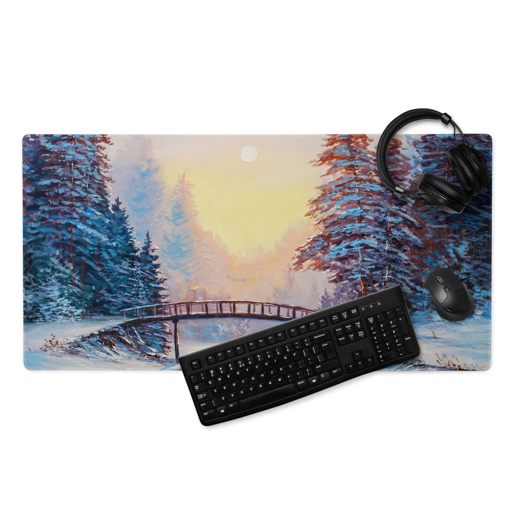 Impressionist winter forest blue gaming mouse pad with snow-covered pines, bridge over icy water, and sunset sky print