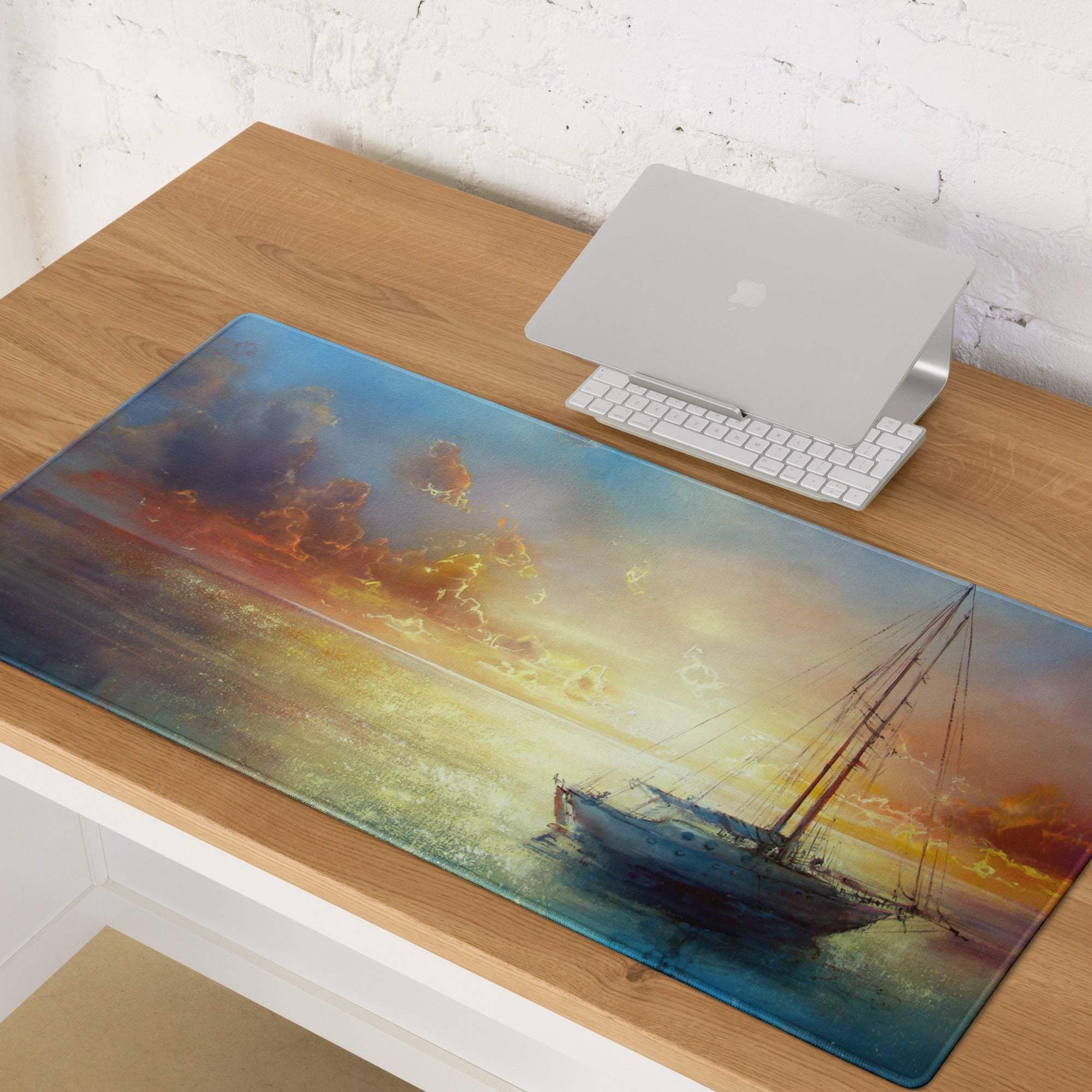 Rectangular glossy mousepad with a vibrant watercolor sailboat sunset painting in orange yellow and blue hues