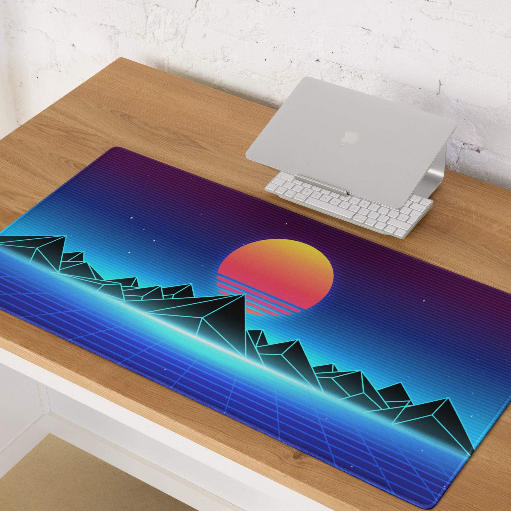 Vibrant retro-futuristic silicone gaming mousepad with purple blue gradient sunset over geometric mountains